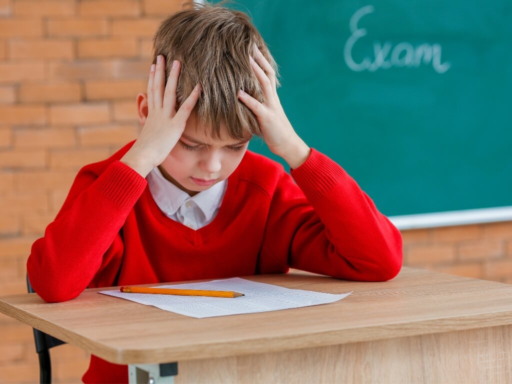 Young child managing exam stress
