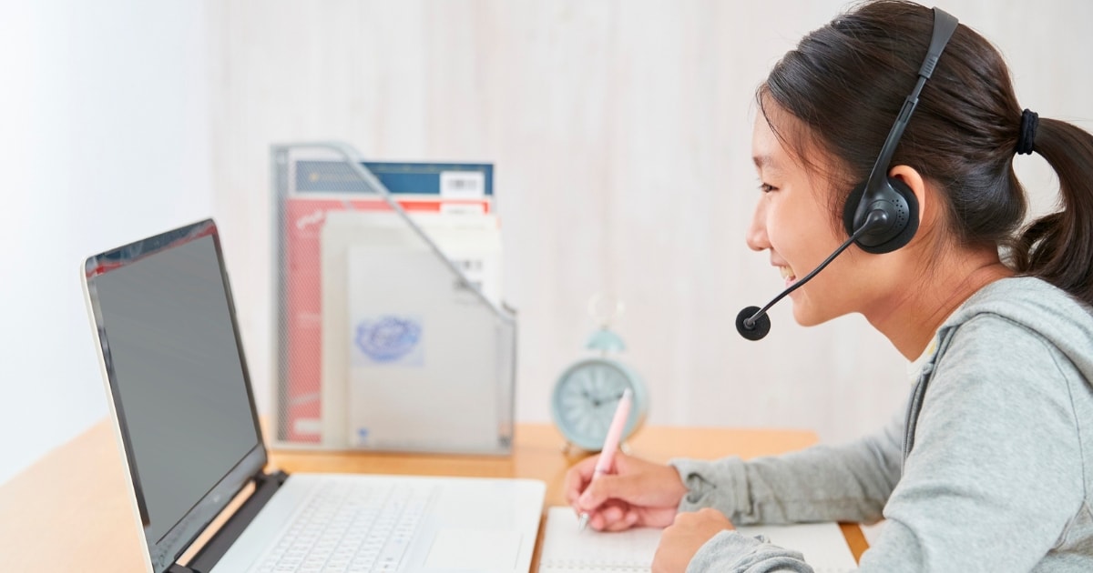 A student taking an online IELTS preparation lesson
