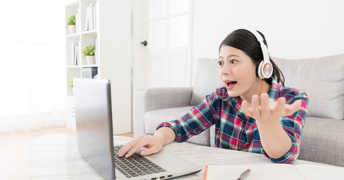 A student practising the IELTS speaking test by video call